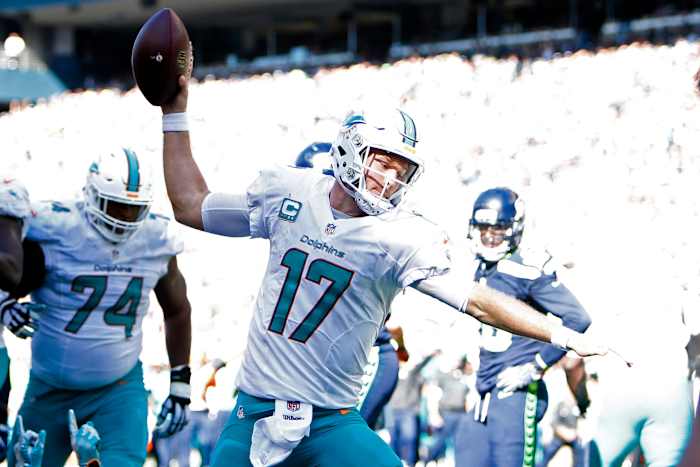 Dolphins quarterback Ryan Tannehill celebrates after rushing for a touchdown against the Seahawks in 2016. Tannehill is the franchise leader in rushing yards among quarterbacks.